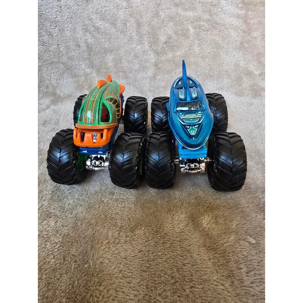 Hot Wheels Monster Trucks Shark Wreak and Piran-ahhh Blue Green Diecast Lot of 2